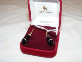 A pair of onyx 9ct mounted drop earrings