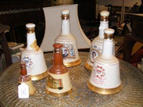 A collection of Bells Scotch whiskey Commemorative