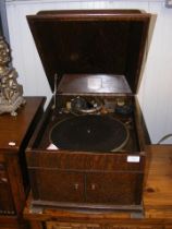 An HMV wind-up oak cased gramophone