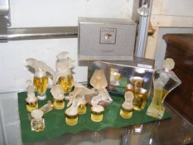 A selection of boxed Lalique and other perfumes