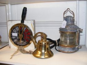 Three items of nautical and marine interest: A vintage brass ship's bell, an engine order telegraph