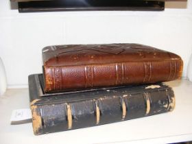 A metal bound Victorian photograph album together