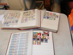 Three albums of World stamps