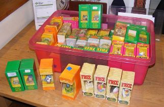 A selection of boxed Tetley Teafolk houses, animal
