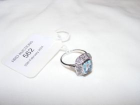 An Art Deco style diamond and topaz? dress ring in