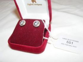 A pair of blue topaz? and diamond stud earrings