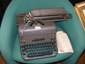 A vintage KMC Remington Typewriter with keyboard m