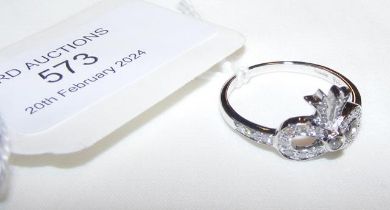 A 9ct white gold diamond mounted dress ring - appr