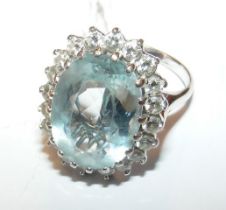 An 18ct white gold aquamarine and diamond ring, th
