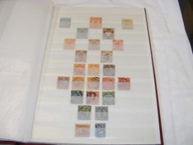 An album of collectable stamps from China, 1893 -