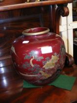 An antique Japanese enamel vase - 23cms high