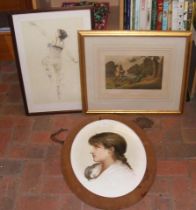 An antique side profile portrait in oval frame tog