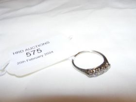 A five stone diamond ring in 18ct white gold setti