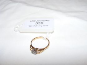 A diamond solitaire ring in 18ct mount