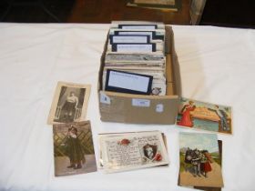 A collection of 450 vintage postcards including gr
