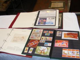 A selection of albums of collectable stamps and co