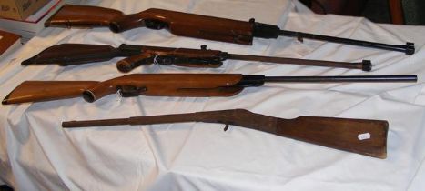 A quantity of air rifles and practice guns includi