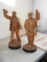 A pair of Victorian terracotta figures of hunting