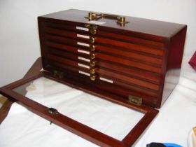 A seven drawer mahogany portable coin collectors c