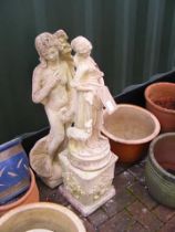 Two garden statues of female figures