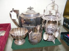 A silver teapot, cream jug, etc.