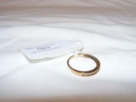 A diamond half hoop eternity ring in 18ct setting