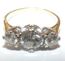 An 18ct three stone diamond ring, the centre stone