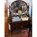 A Victorian mahogany dressing chest with oval swin