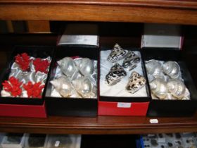 Four boxed sets of Hans Turnwald napkin rings