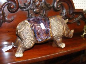 A Japanese studio pottery rhinoceros - 31cms long