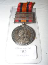 A Queen's South Africa medal with four clasps - Tr
