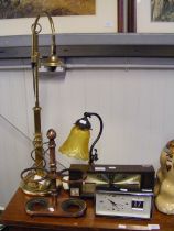 Two vintage bedside clocks, together with lamps, e