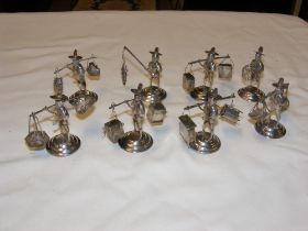 A selection of small silver Oriental figures