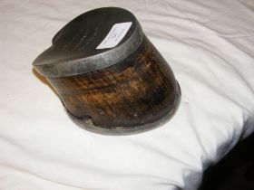 An unusual 'hoof' paperweight with metal mounts -