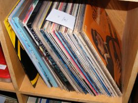 Assorted vinyl records, including Red Hot Chili Pe