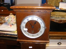 A 1940's oak cased Grandmother clock made by H Gow