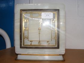 An onyx stone mantel clock