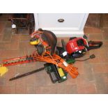 A Mountfield MHJ2424 petrol powered hedge-trimmer, toge