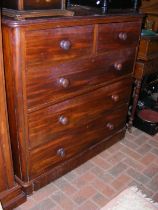 A Victorian mahogany chest of two short and three