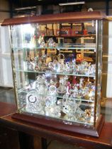 A small collection of crystal and glass ornaments