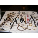 A selection of costume jewellery and wrist watches