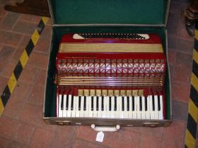 A Hohner Atlantic IV accordion in hard case