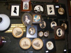 A collection of antique miniature portraits and si