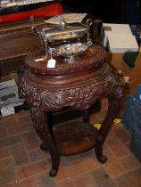 A Chinese hardwood plant stand - 70cms high