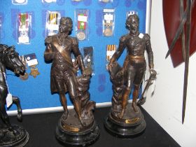A pair of reproduction cast metal military figures