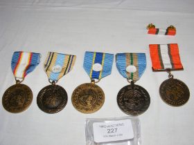 Four United Nation war medals, together with a Mul