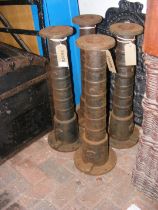 A set of four old cast metal water pump stands, ea