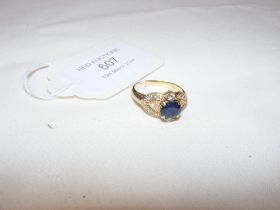 A sapphire and diamond ring in 18ct setting
