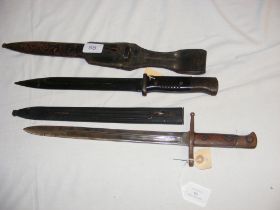 A Second World War sword bayonet with metal scabba