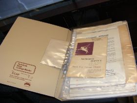 A folder containing telegrams, hand written letter